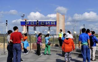 Tourists Visit Sino-Russian Border Gate in Manzhouli 