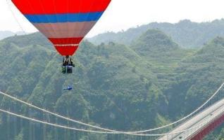 Norway Adventurer Eskil Dances Ballet on 330m High Girder of Aizhai Bridge 