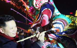 Xiangxi Fire Dragon Dance Held to Greet Spring Festival 