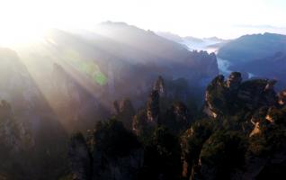 Sunrise in Zhangjiajie Huangshi Village after the rain 